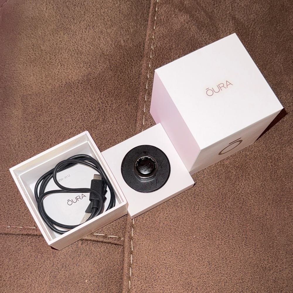 Oura Black Charging Kit And Ring.